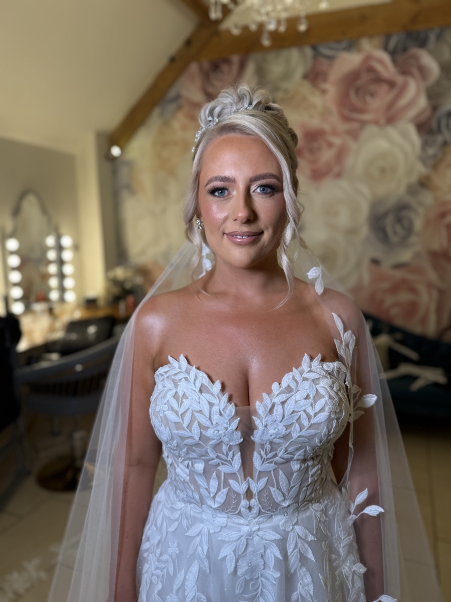 Bride with glowing skin and sparkling veil