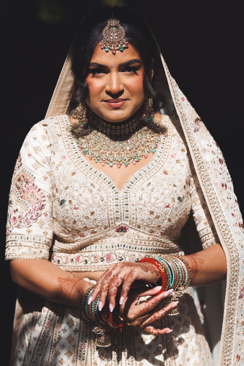 Asian bride with bold bridal makeup and jewellery